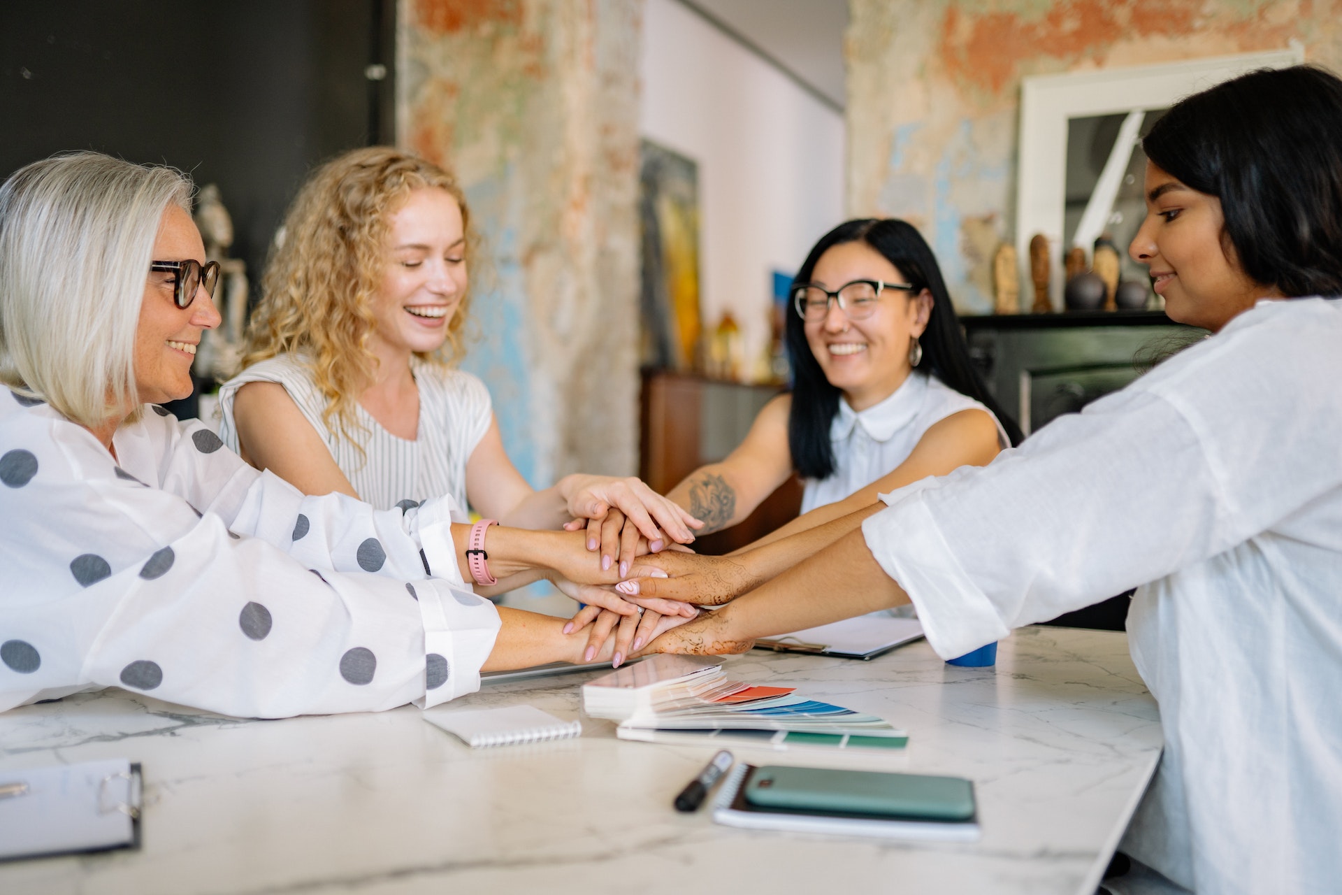 Diverse group of women discussing effective management