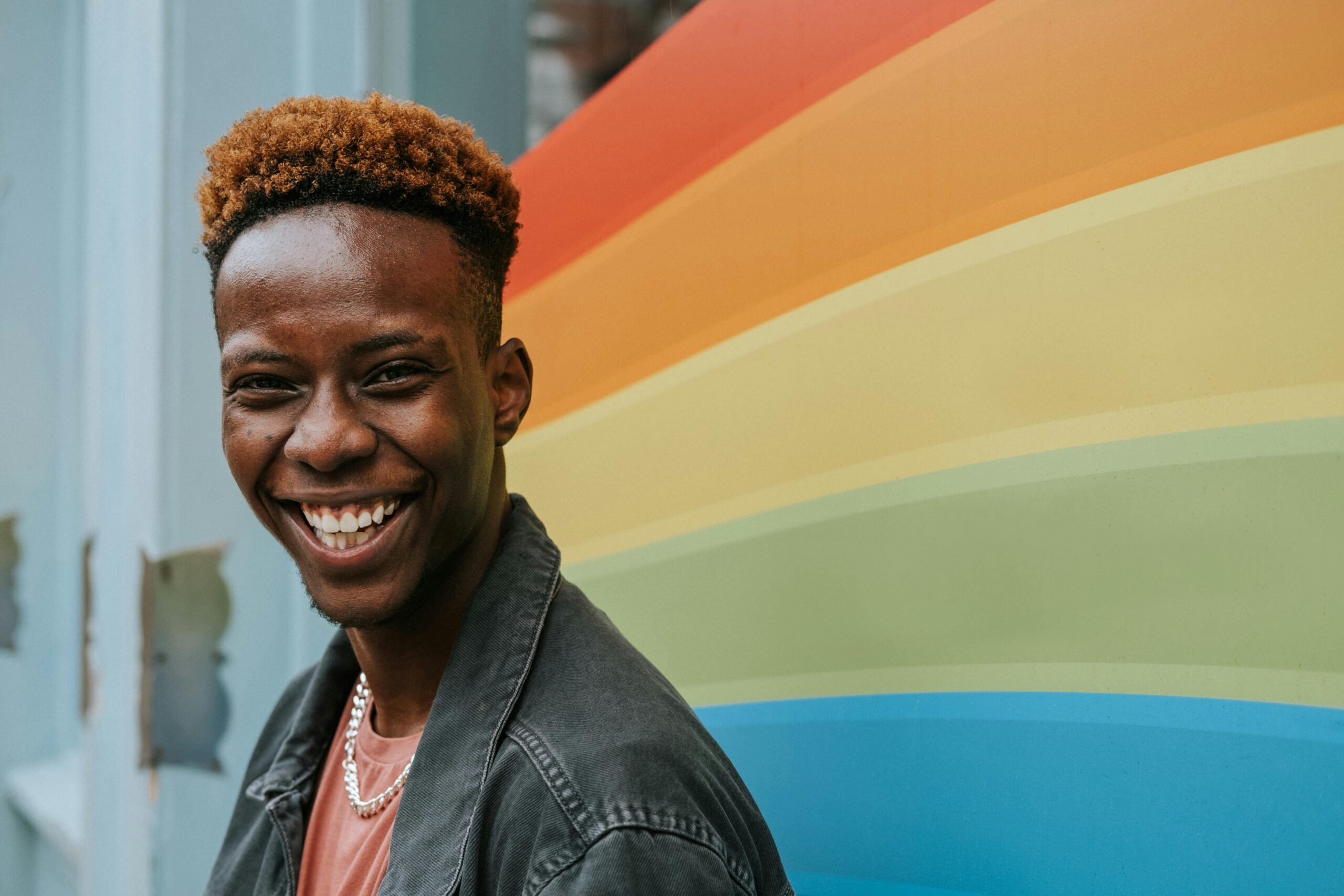 A young man participating in a gay pride